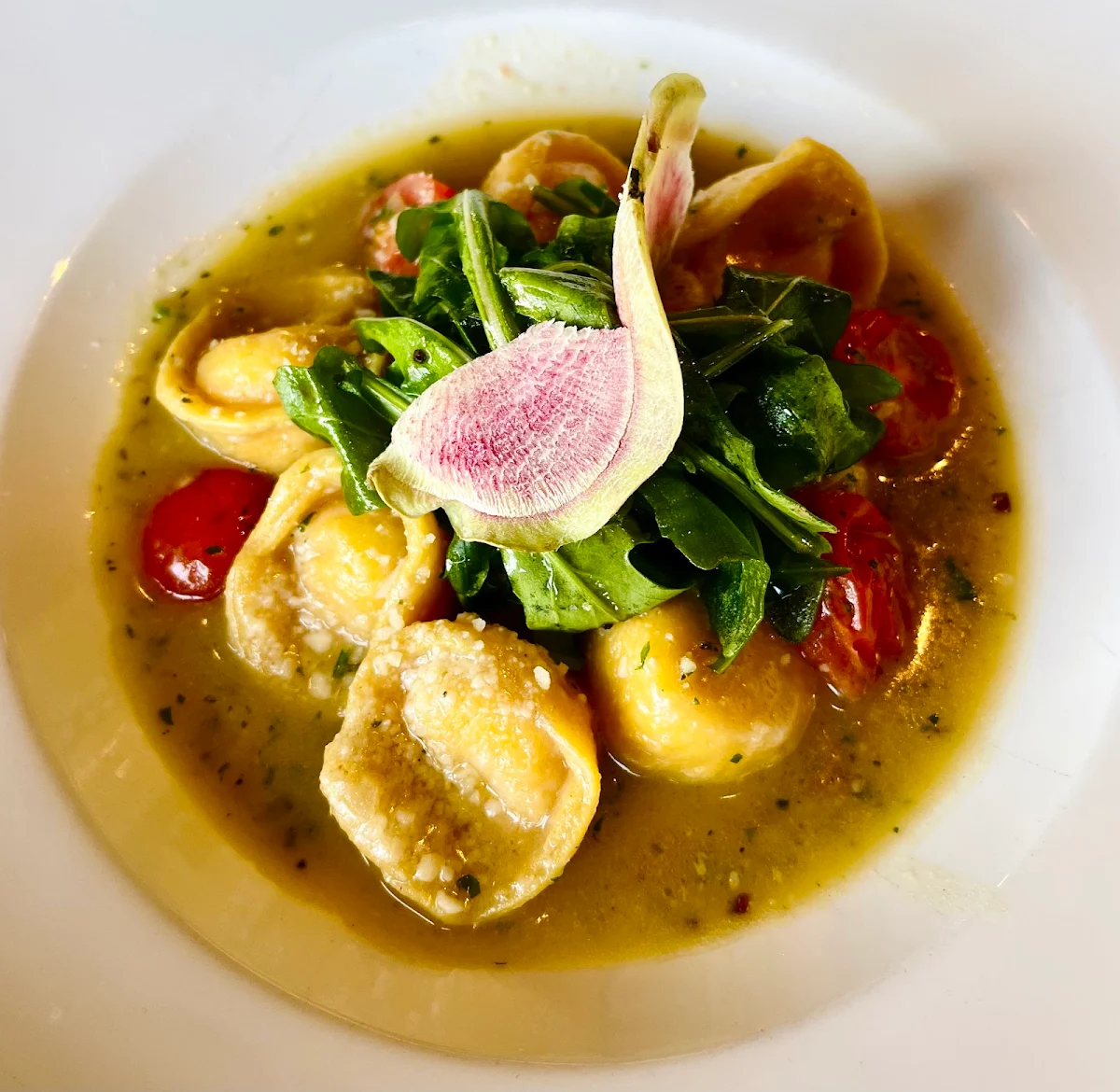 Sweet Corn Ravioli with Lobster Tomato and Olive Oil