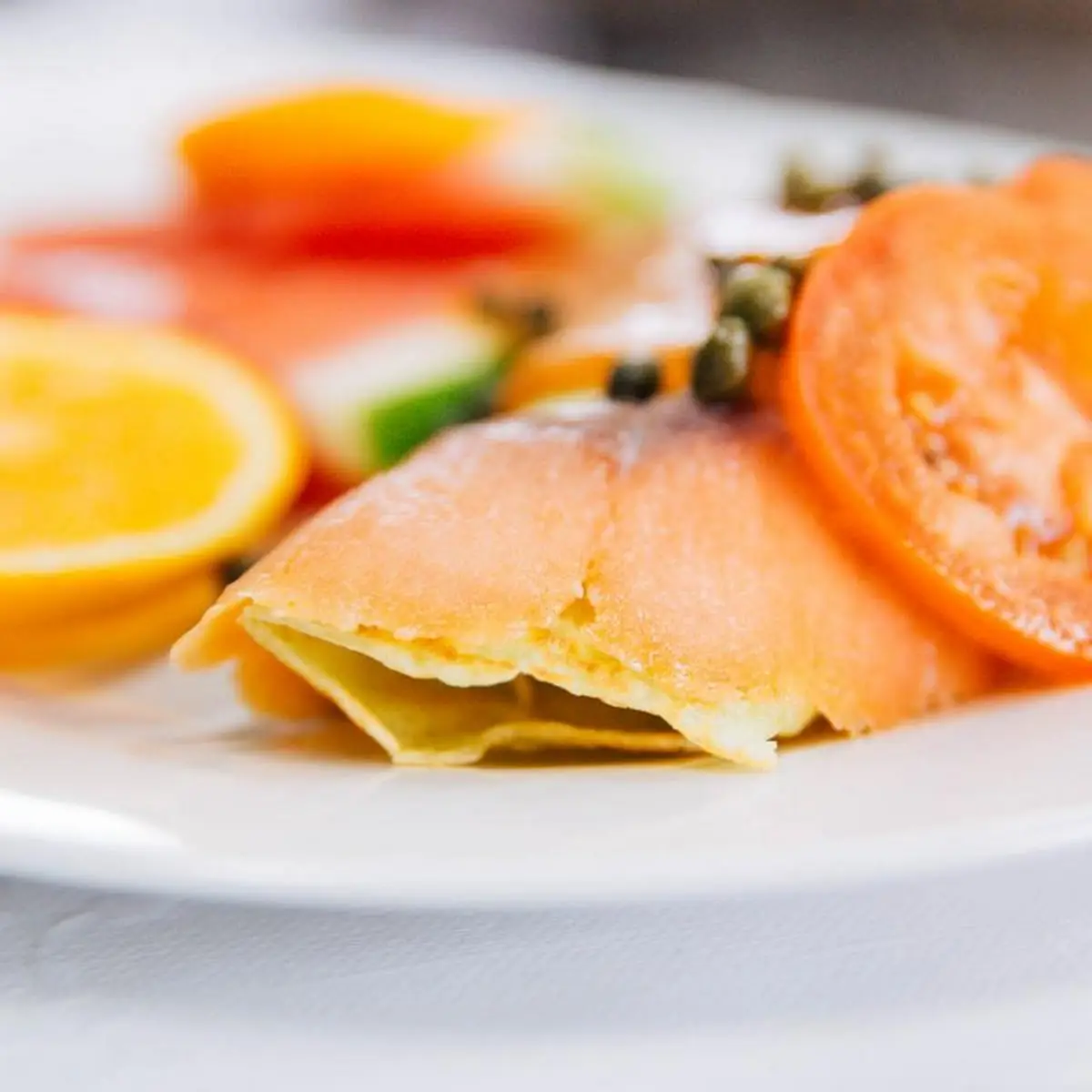 Eggs with Smoked Salmon Smoke Salmon Tomato & Capers in Spinach Crepe