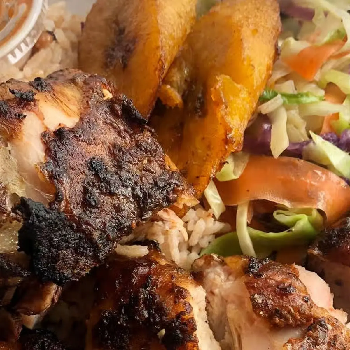 Jerk Chicken & Fries or Rice & Beans