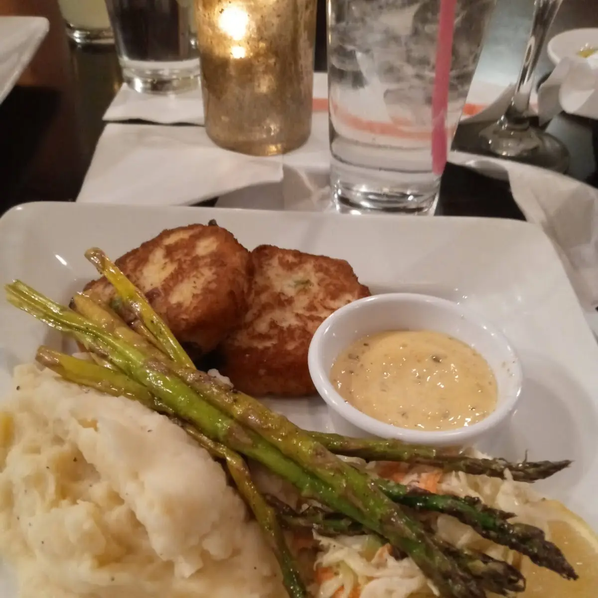 Crab Cakes Garlic Mashed Potatoes Asparagus and Cole Slaw