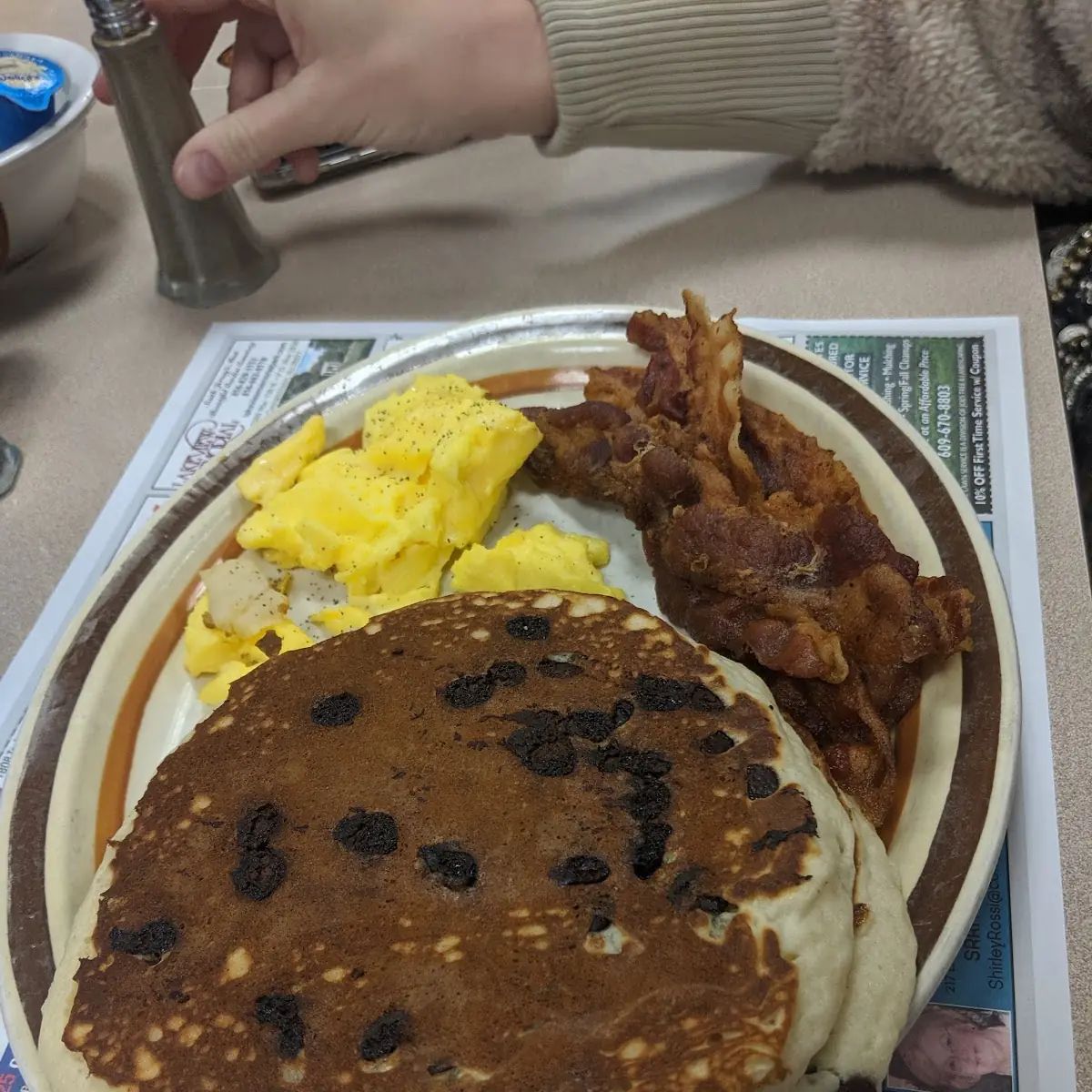 Chocolate Chip Pancakes Scrambled Eggs and Bacon
