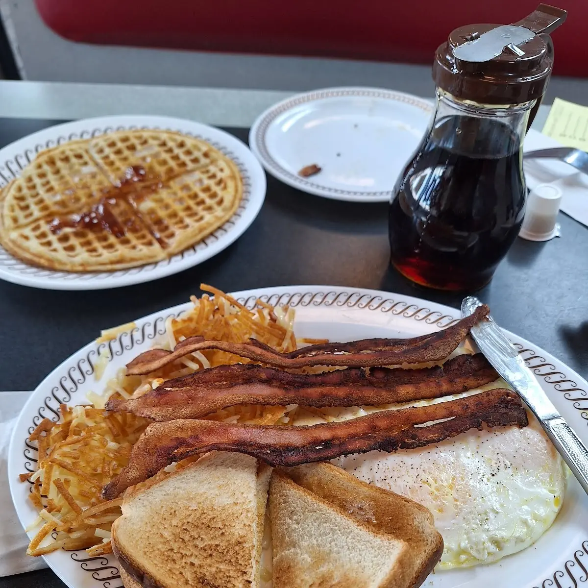 2 Egg Breakfast Bacon N Hashbrowns with Cheese Grits and Waffle and Sourdough Toast and Bacon