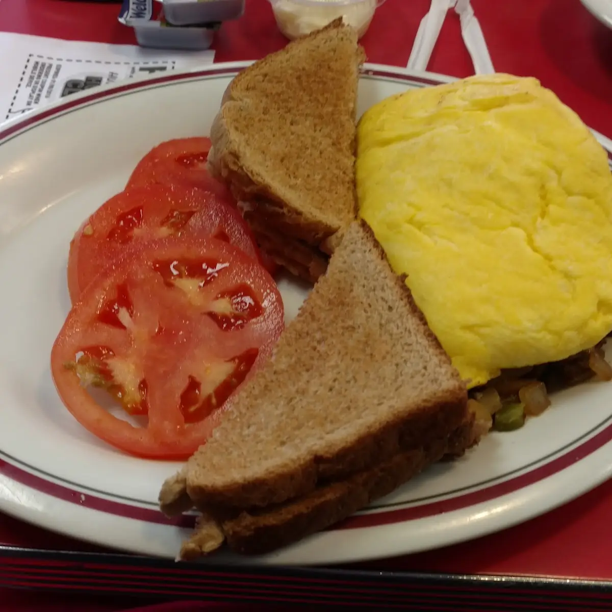 Philly Cheesesteak Omelet with Tomato Slices