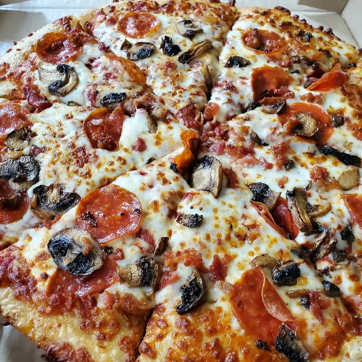 Pepperoni and Mushroom Deep Dish Cheese Pizza
