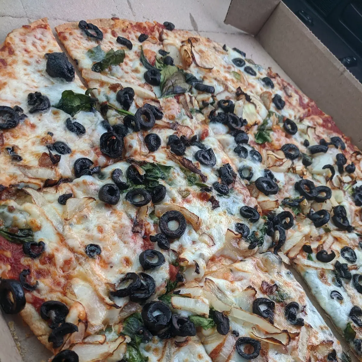 Thin Crust Olive Spinach Onion Pizza