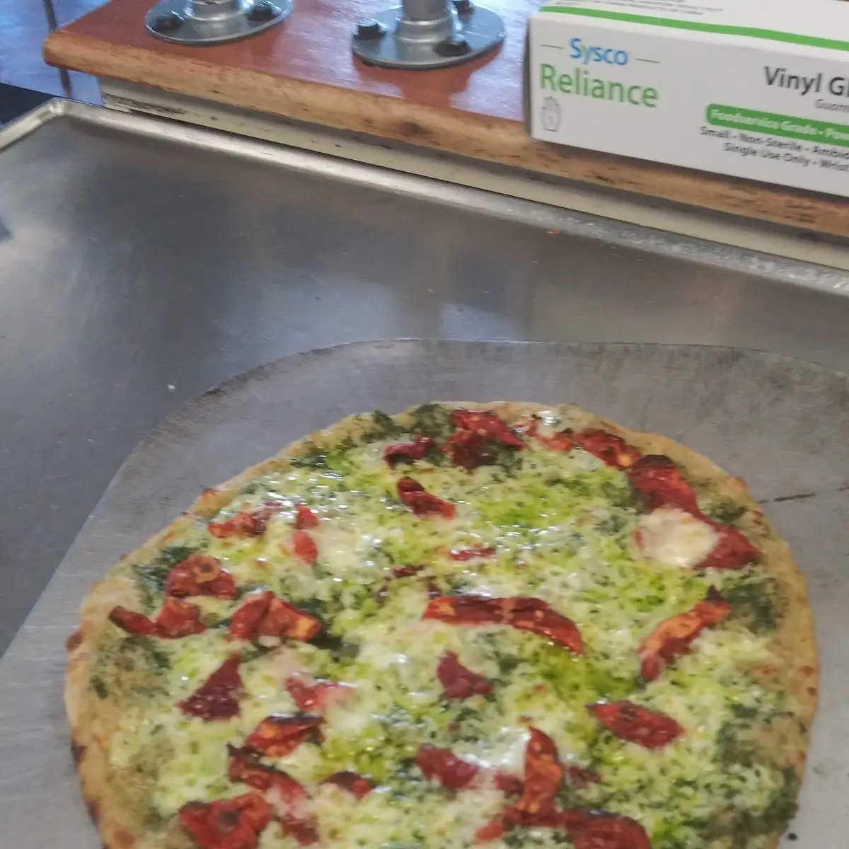 Basil Pesto & Sun Dried Tomatoes Pizza