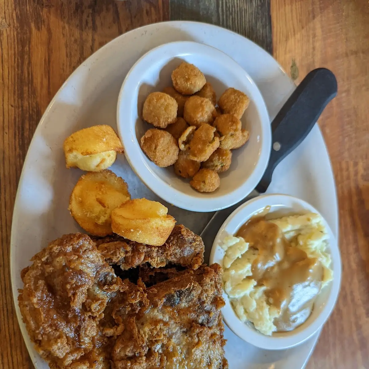 2 Fried Pork Chops 2 Sides Bread and Sweet Tea 8 90