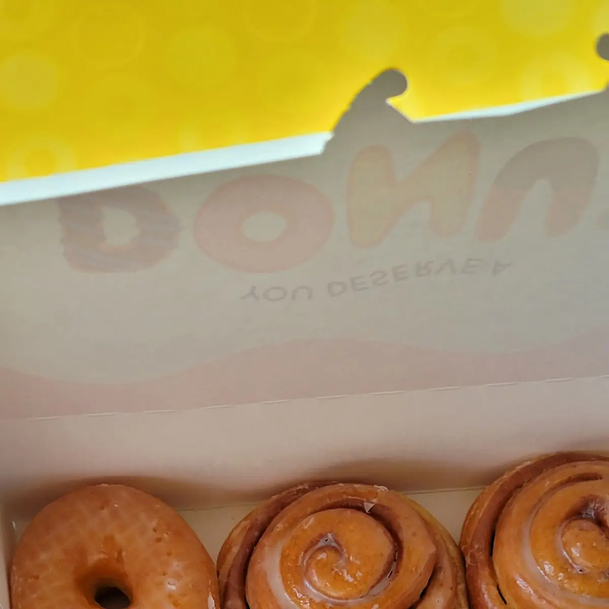 3 Glazed Donuts 2 Cinnamon Rolls &1 Boston Creme Filled