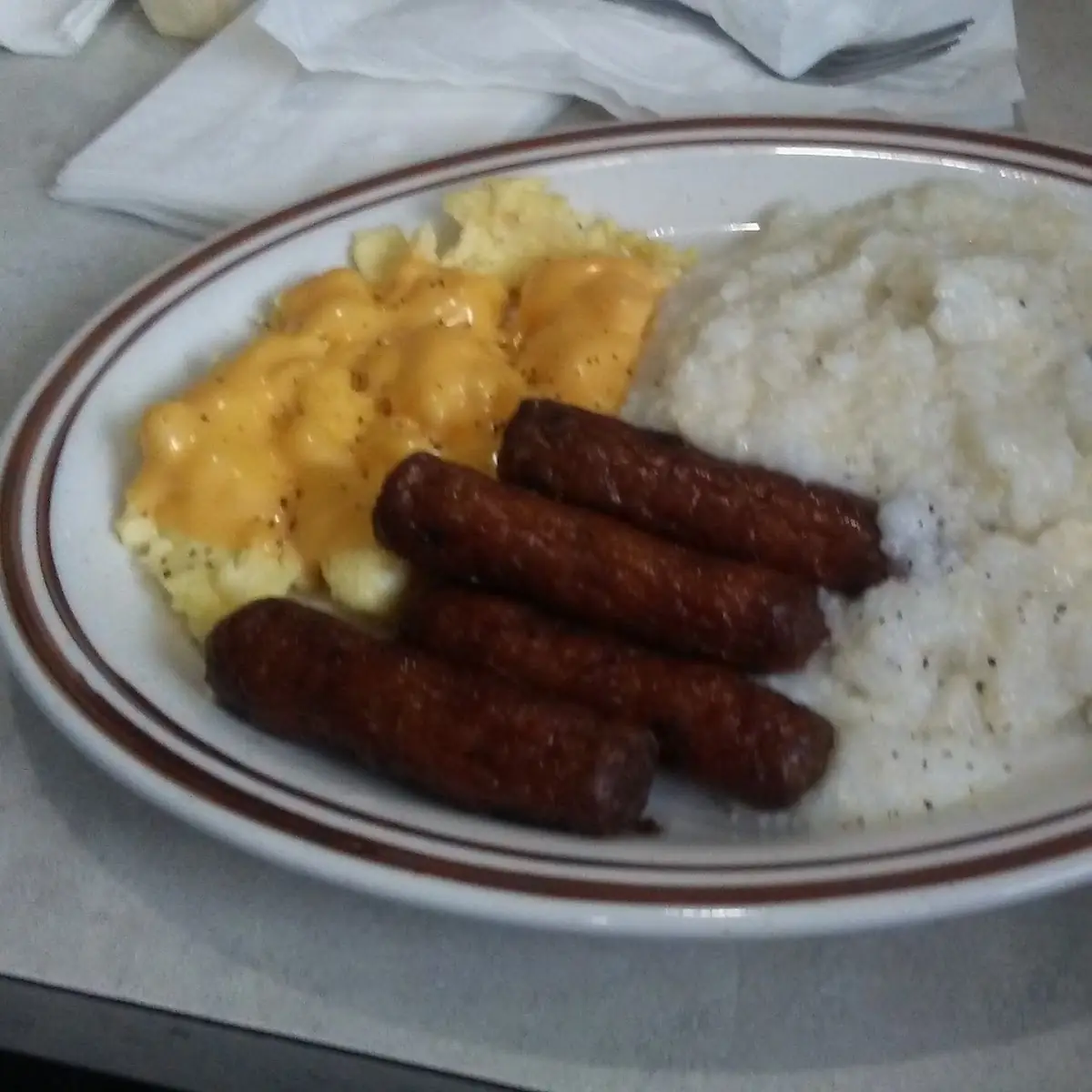 Eggs with Hash Browns or Grits or Toast