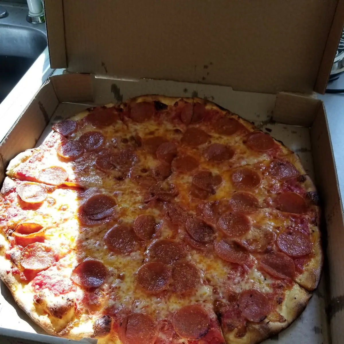 Half Pepperoni Half Sausage Pizza