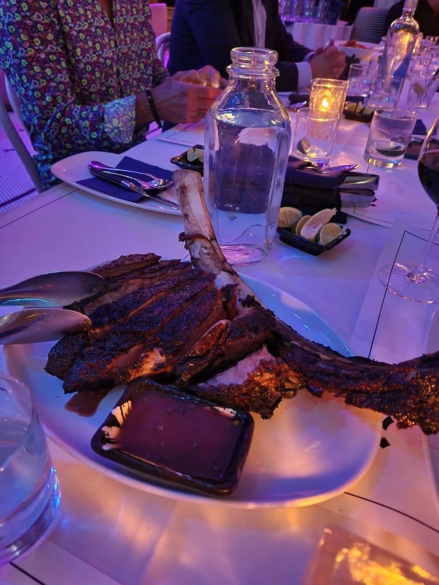 Tomahawk Steak, Mademoiselle Raw Bar + Grill