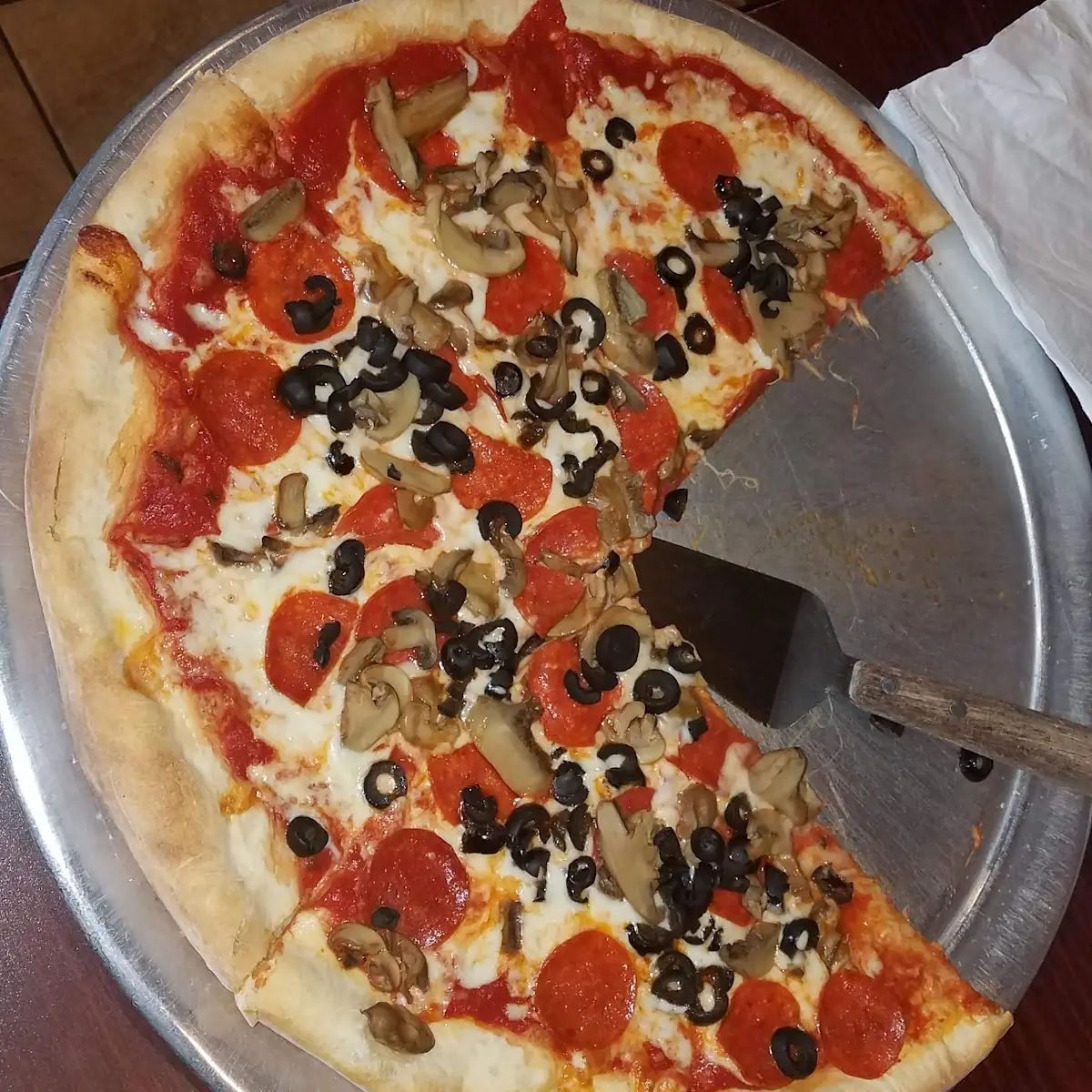 Pepperoni Pizza with Black Olives and Mushrooms