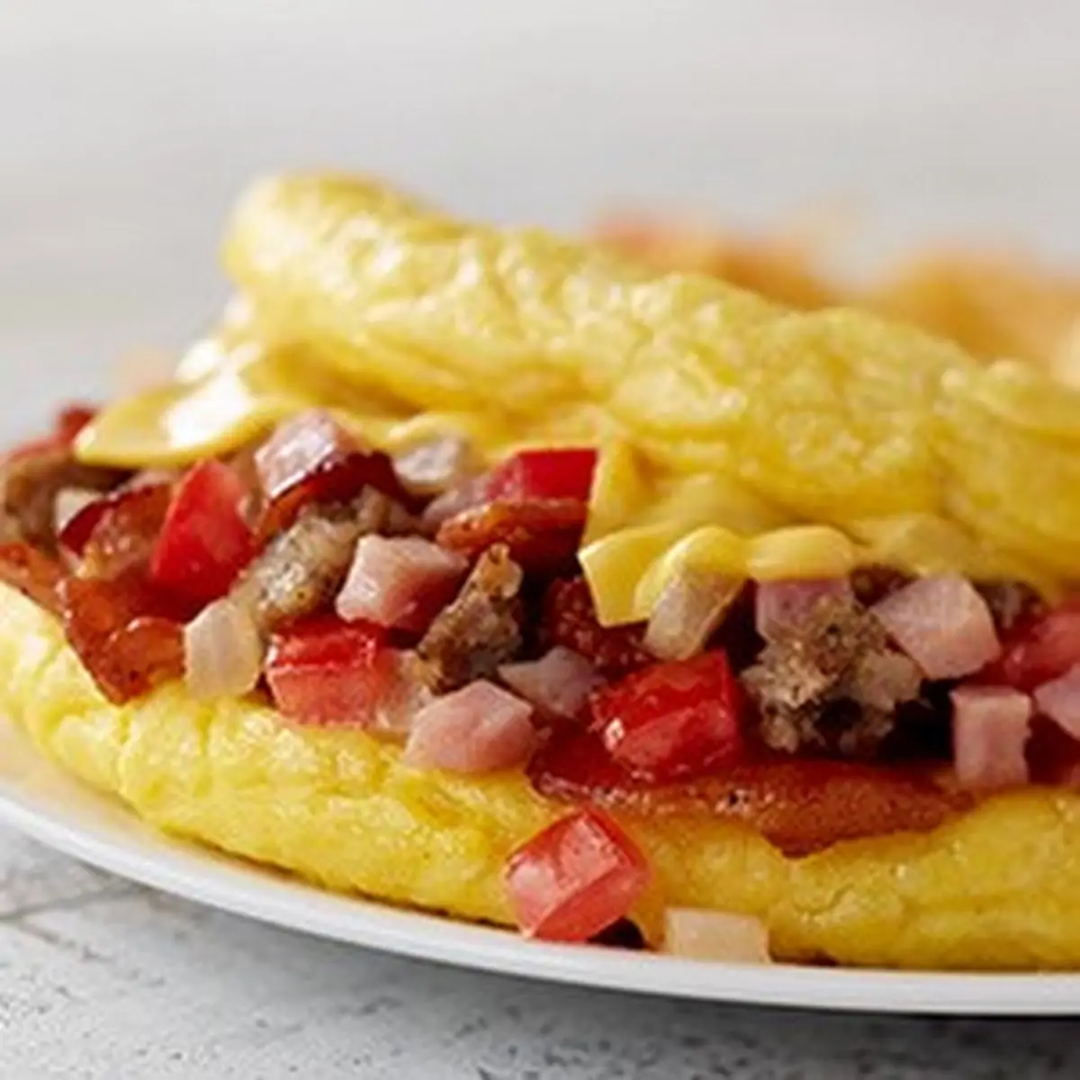 Bacon Egg and Cheese Melt with Grits