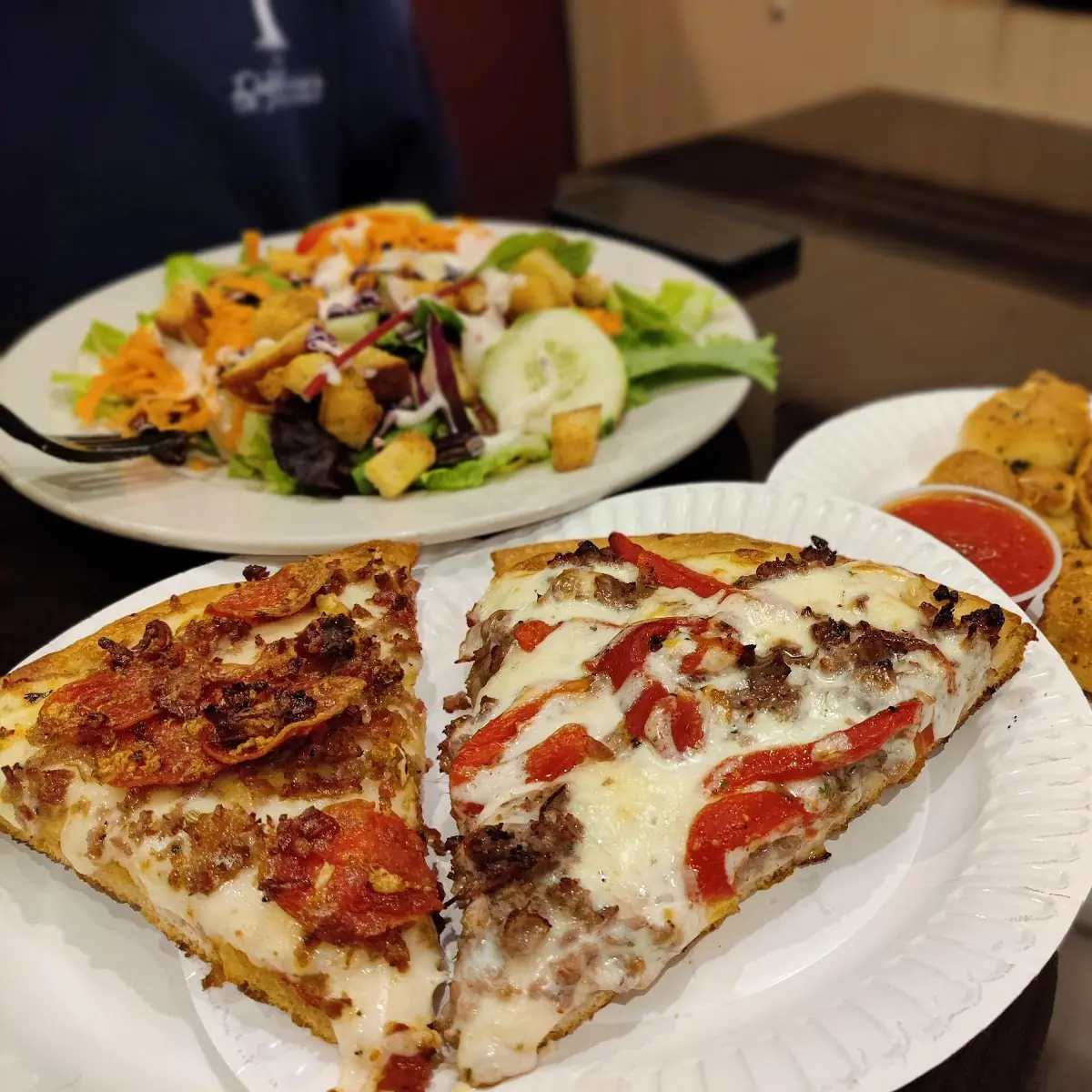 Meat Lovers Pizza Slice and Steak Ranch Slice with a Carlycci's Cascade Salad