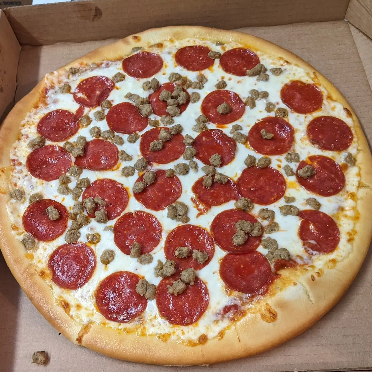 Pepperoni Olive and Mushroom Pizza