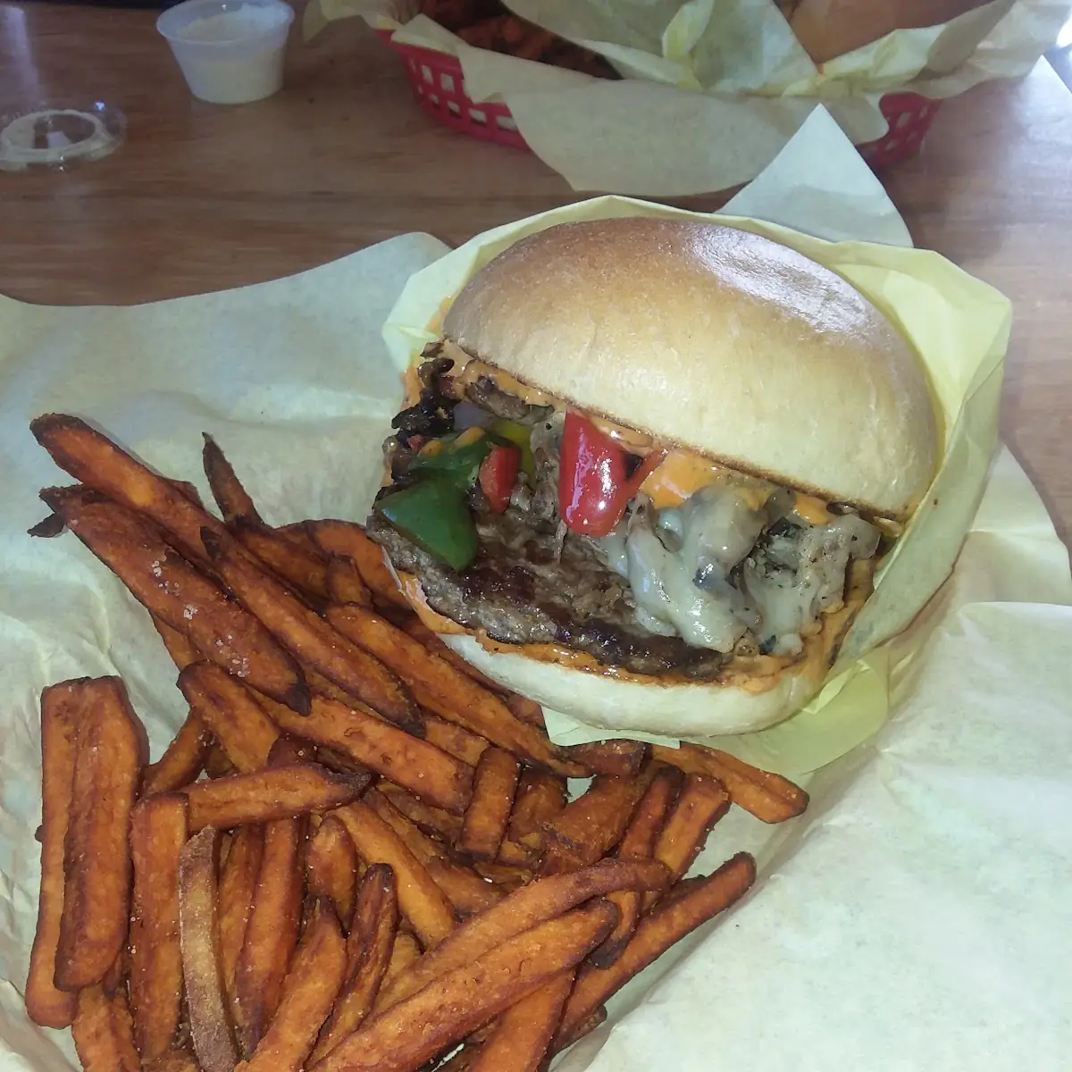 Philly Cheese Steak Burger and Sweet Potato Fries