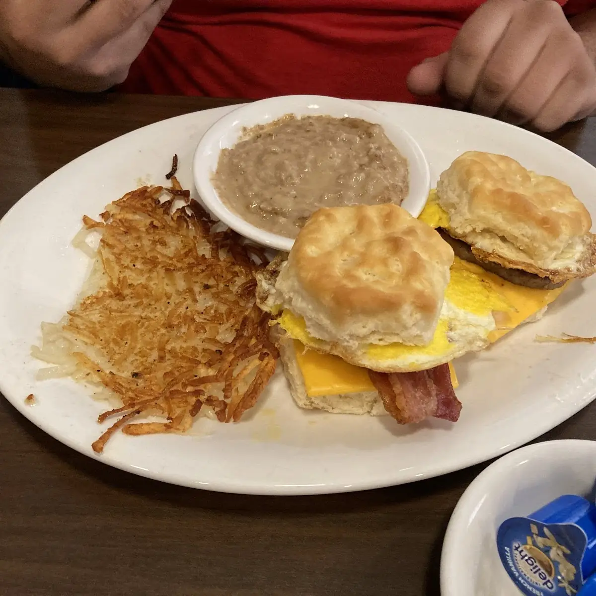 Chicken Fried Steak with Farm Fresh Eggs Hashbrowns and Biscuits