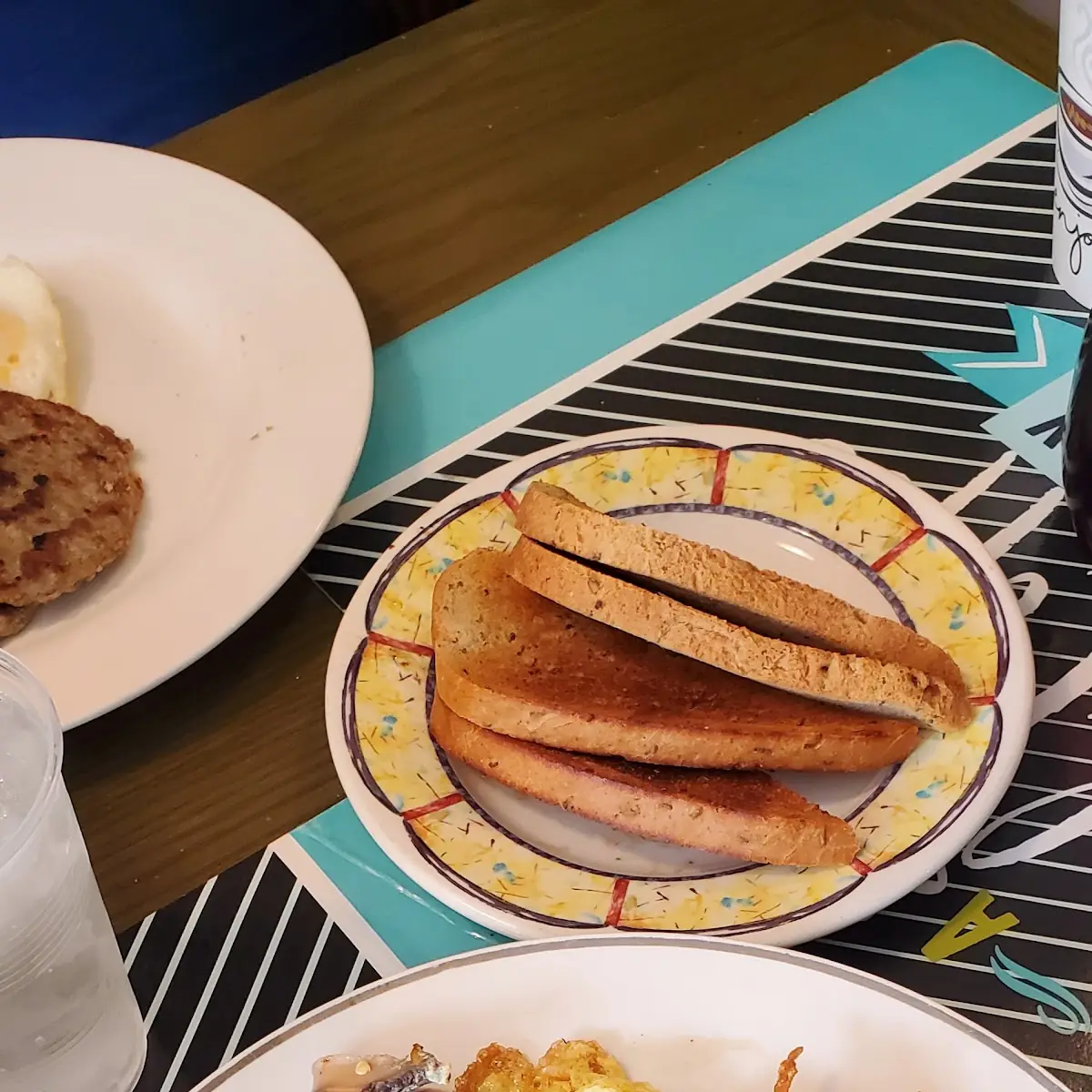 Silver Dollar Pancake with One Scrambled Egg Cheese Available for Additional Charge