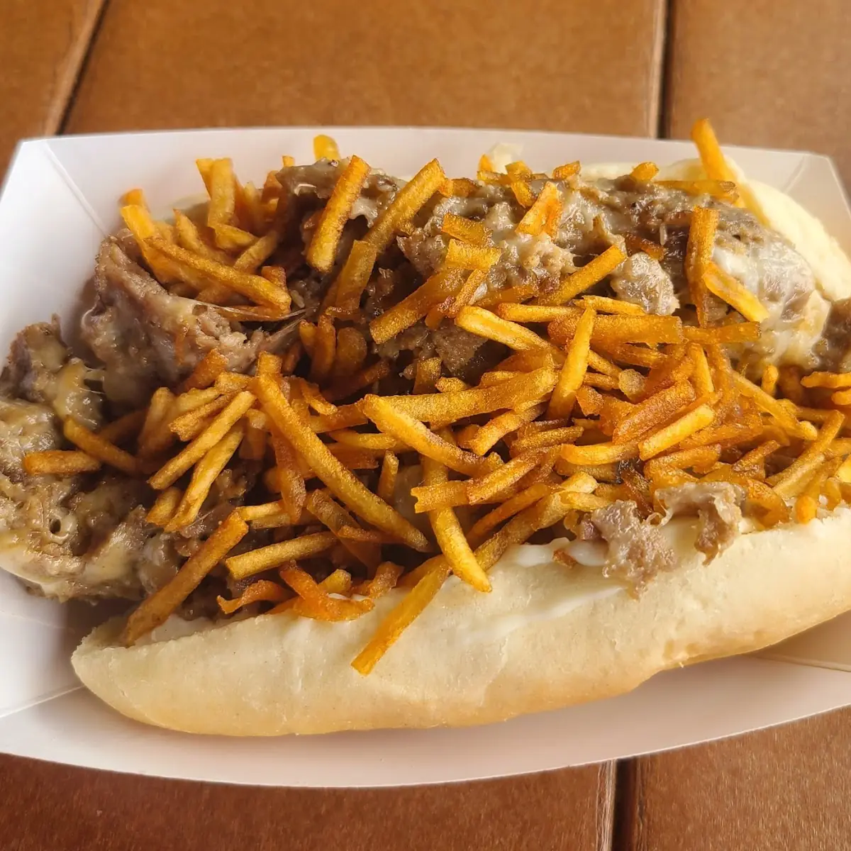 Steak Sandwich with Fries and Onion Strings