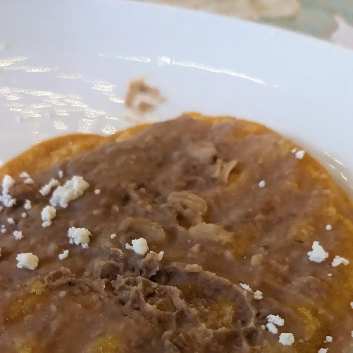 Tostada with Refried Beans