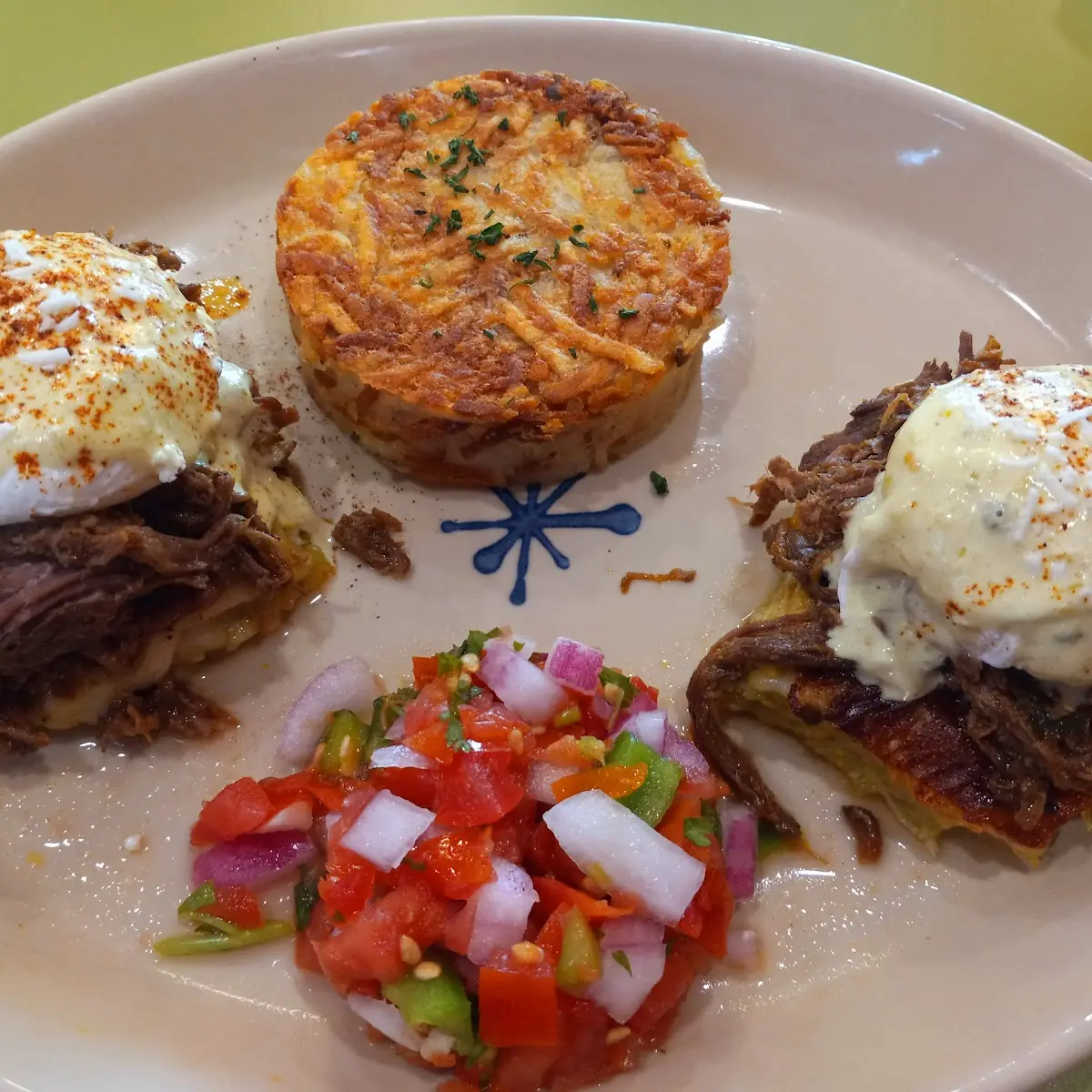 Barbacoa Green Chile Eggs Benedict