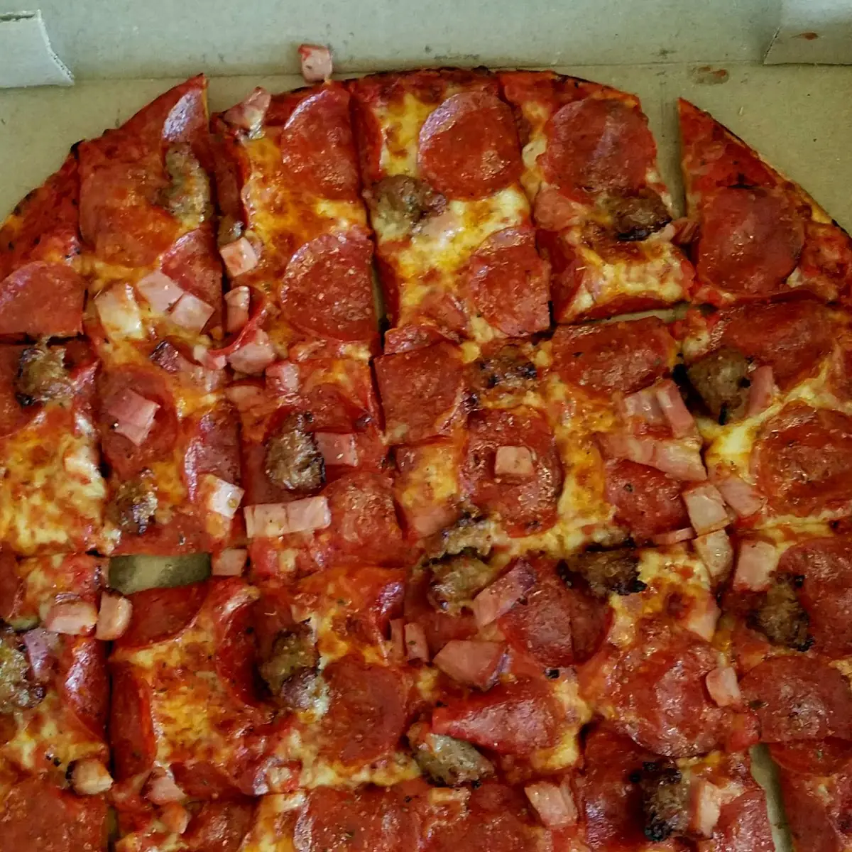 Pepperoni Ham and Sausage Pizza