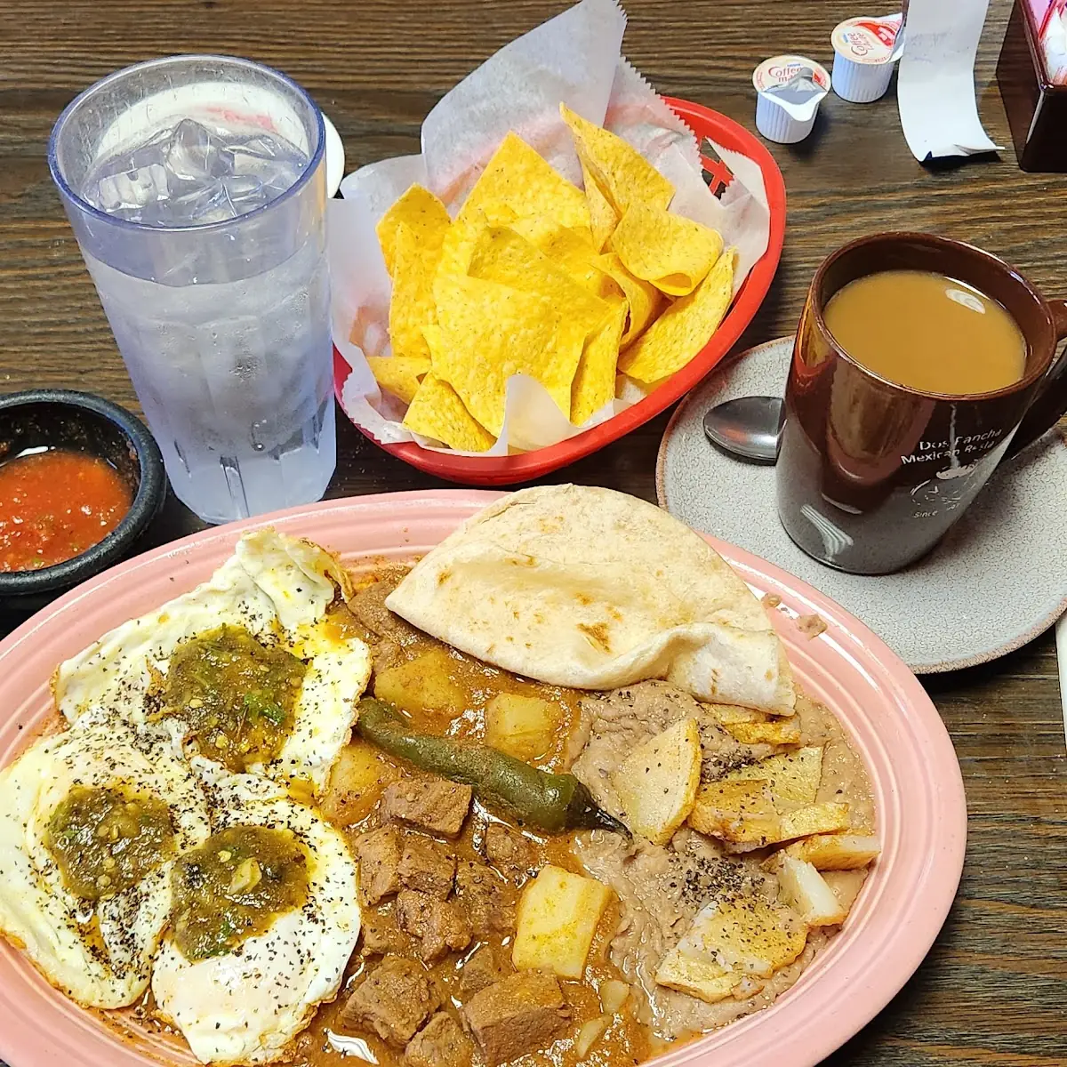 Robert's Special Carne Guisada with Beans 3 Eggs Fried Papas Salsa Verde