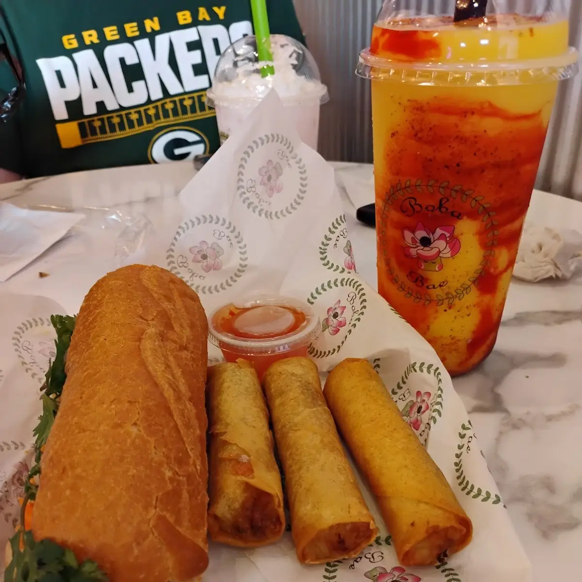 Chicken Sandwich and Egg Rolls