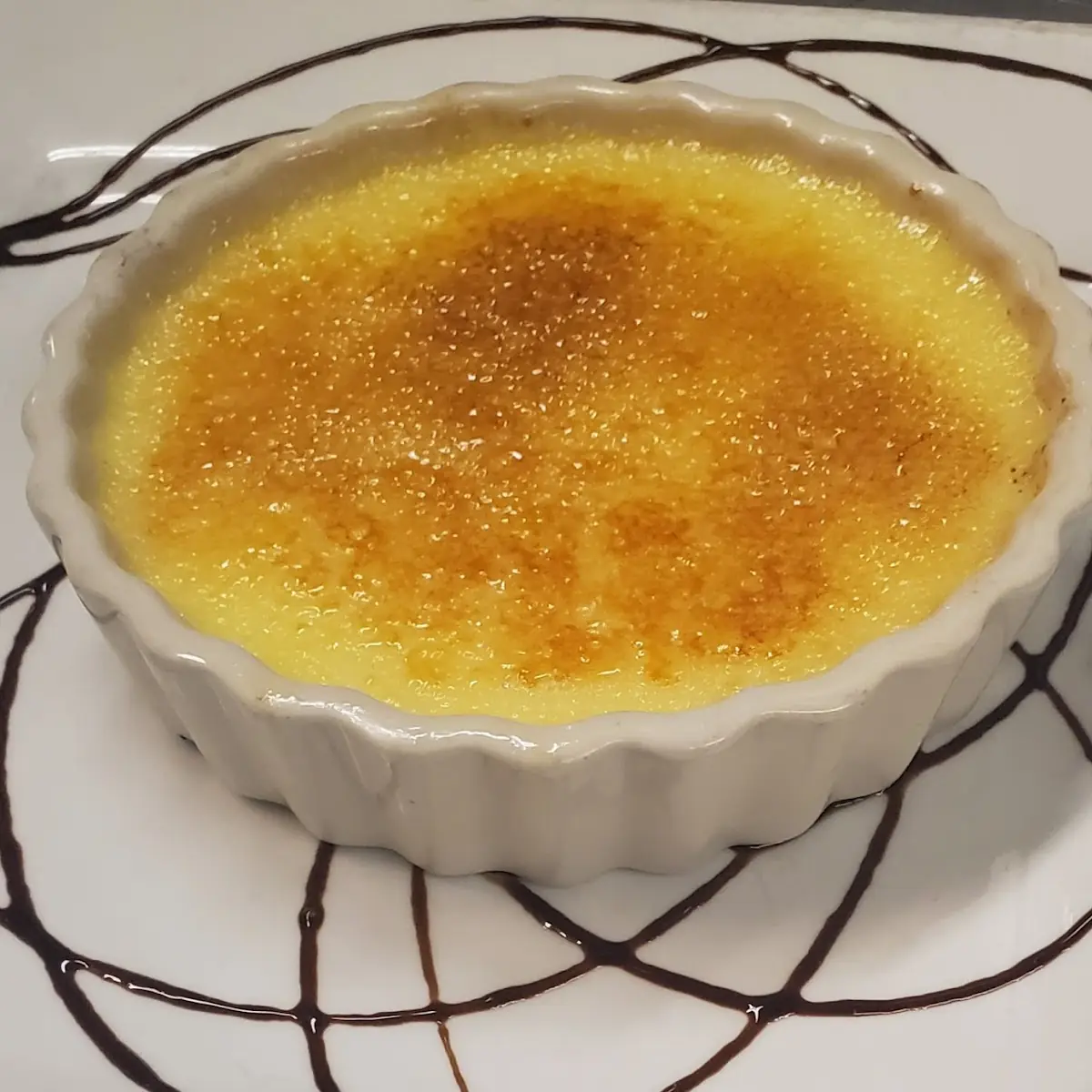 Creme Brulee with Blackberry Compote