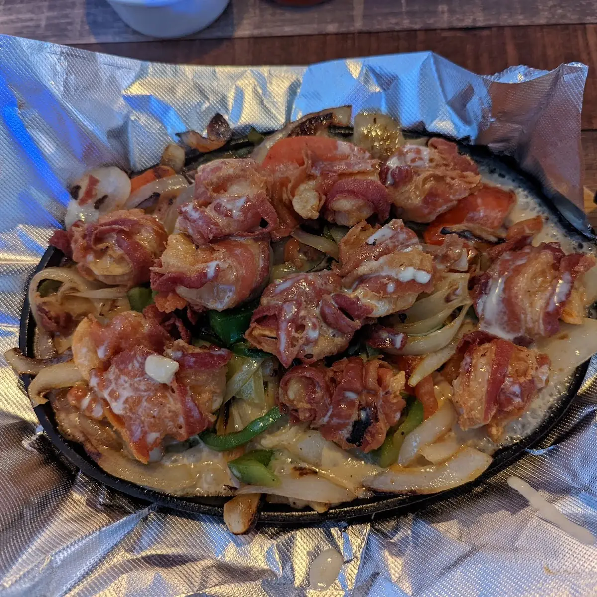 Bacon Wrapped Shrimp Topped with Cheese Sauce