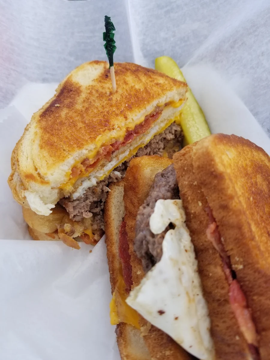 Heart Attack Burger Stacked Burger with Egg Between 2 Grilled Cheese with Bacon