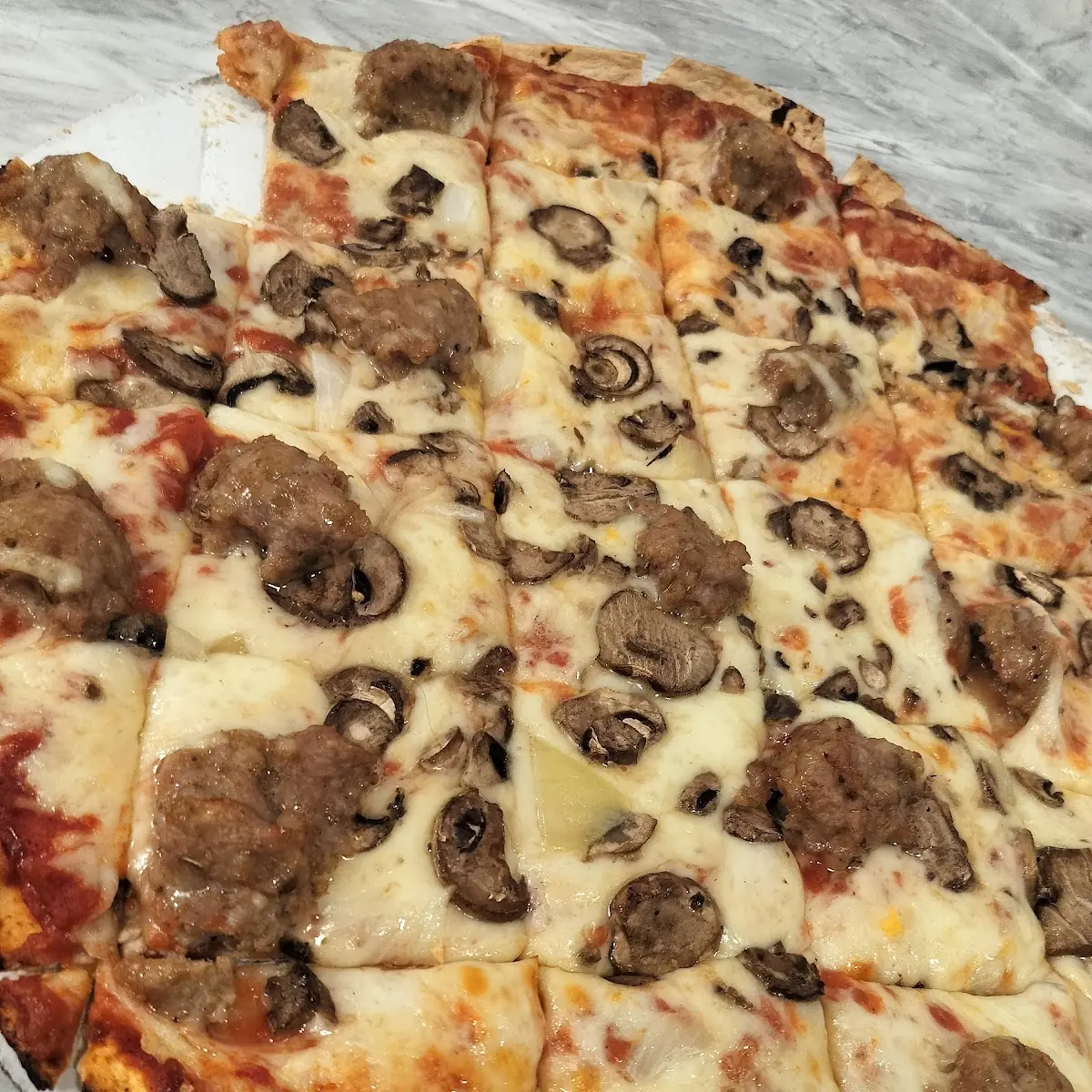 Fresh Sausage Fresh Mushroom Pizza