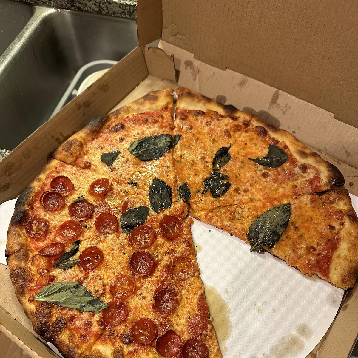 Cheese Pizza with Basil Leaves