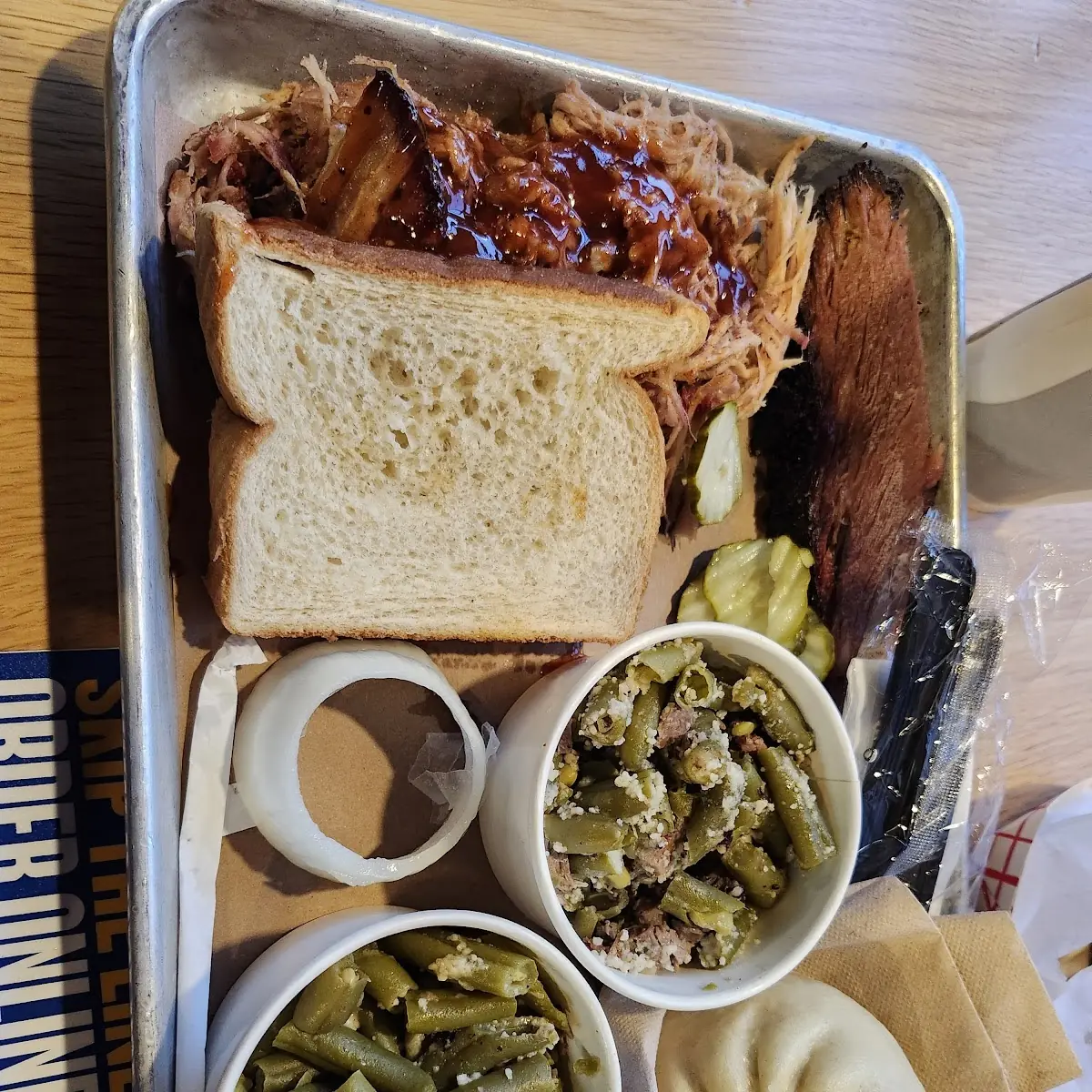 Sliced Brisket with Baked Beans and Corn Pudding