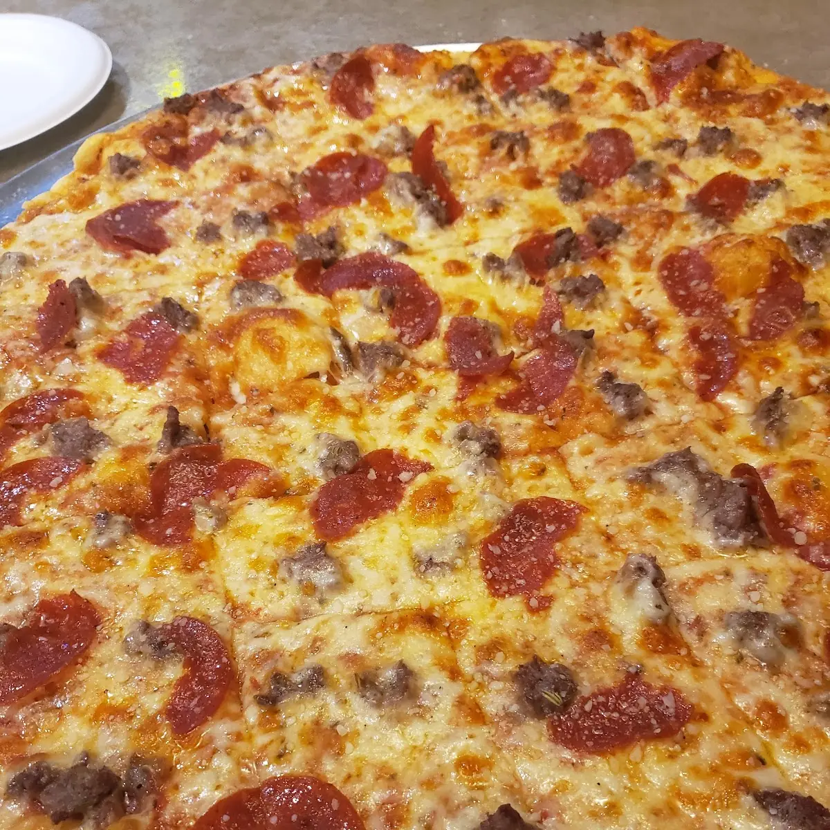 Thin Crust Cheese Sausage Pepperoni Pizza