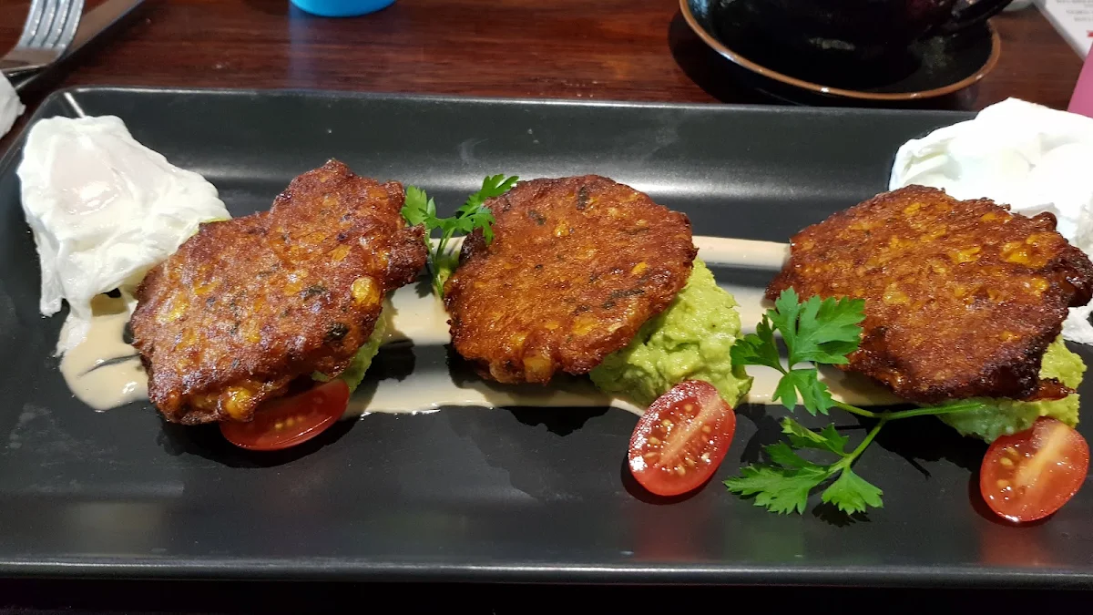 Corn Fritters on Smashed Avocado