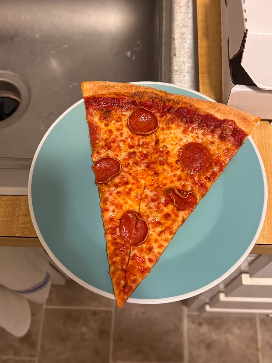 Thin Crust Pepperoni Pizza Slice