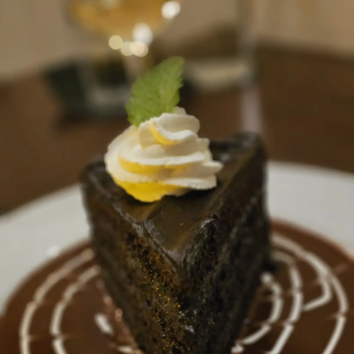 Double Layer Chocolate Cake with Chocolate Sauce