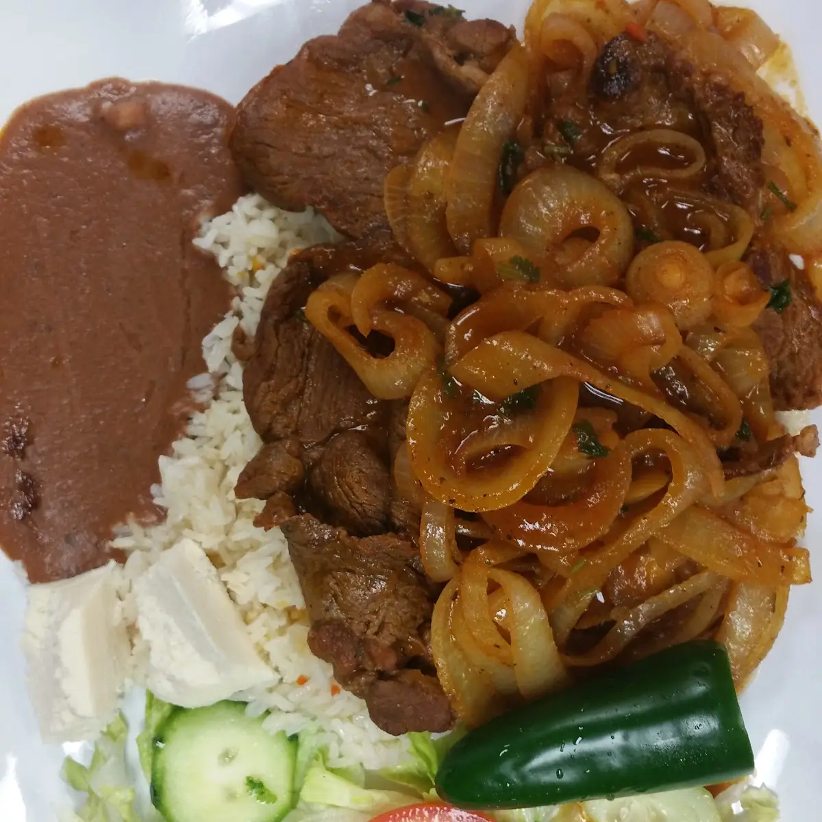 Bistec Encebollado