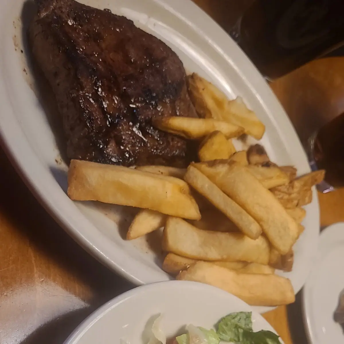 Buttered Com House Salad Steak Fries