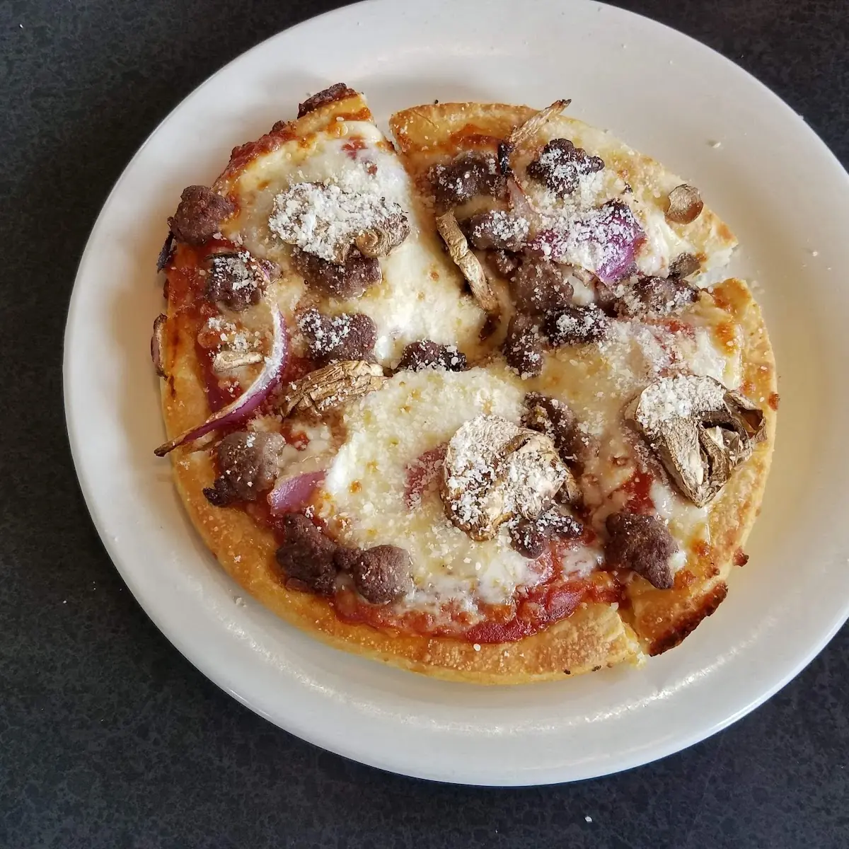 Personal Pizza with Ground Beef Onions Mushrooms and Cheese