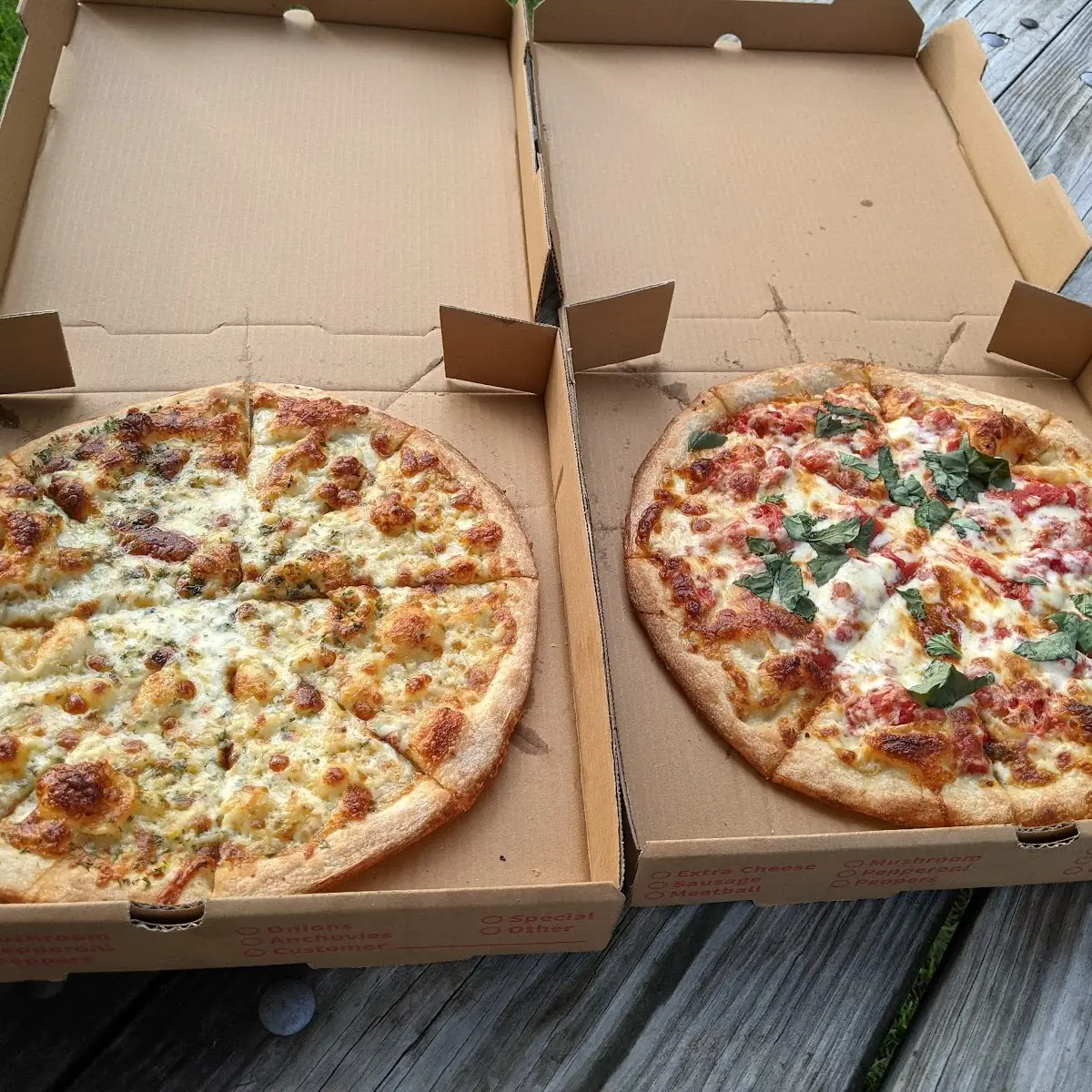 Medium White Pizza and a Medium Margherita Pizza