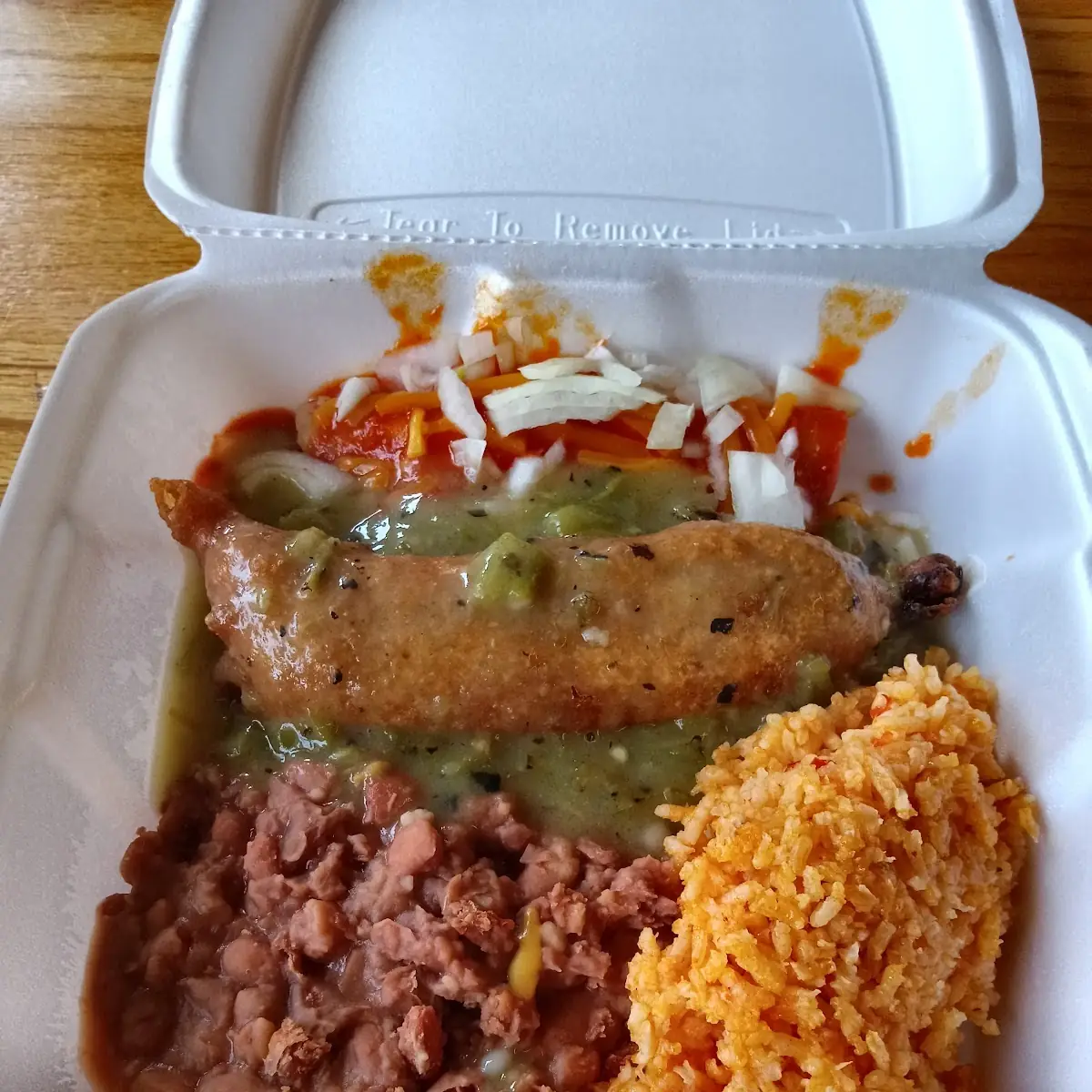 Enchilada Plate with Ground Beef Beans and Rice