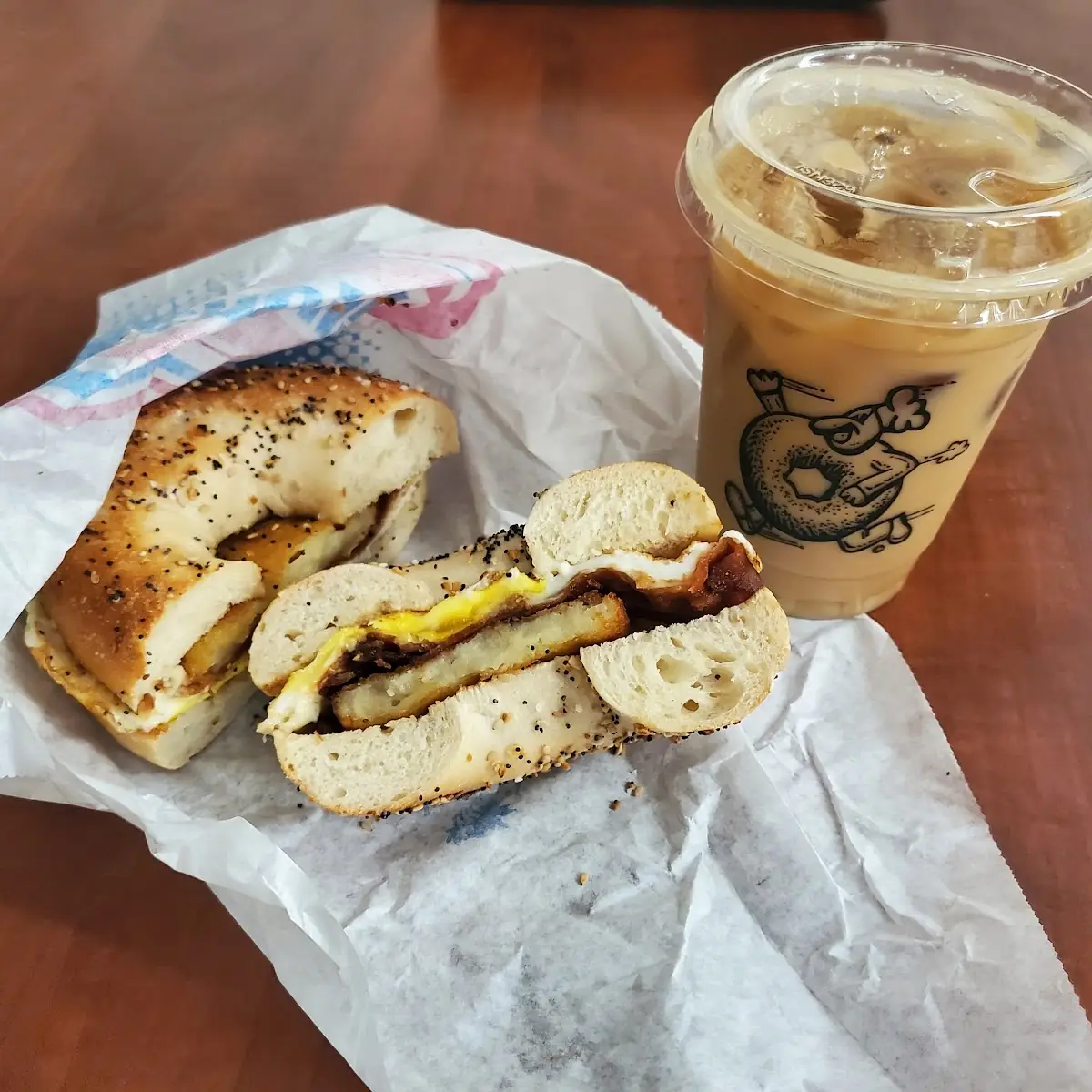 Bacon Egg and Cheese with a Hasbrown in an Everything Bagel