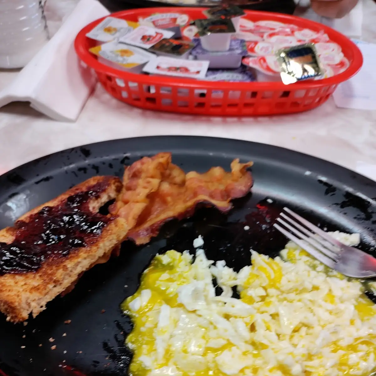 Bacon and Eggs with Hash Browns and Wheat Toast