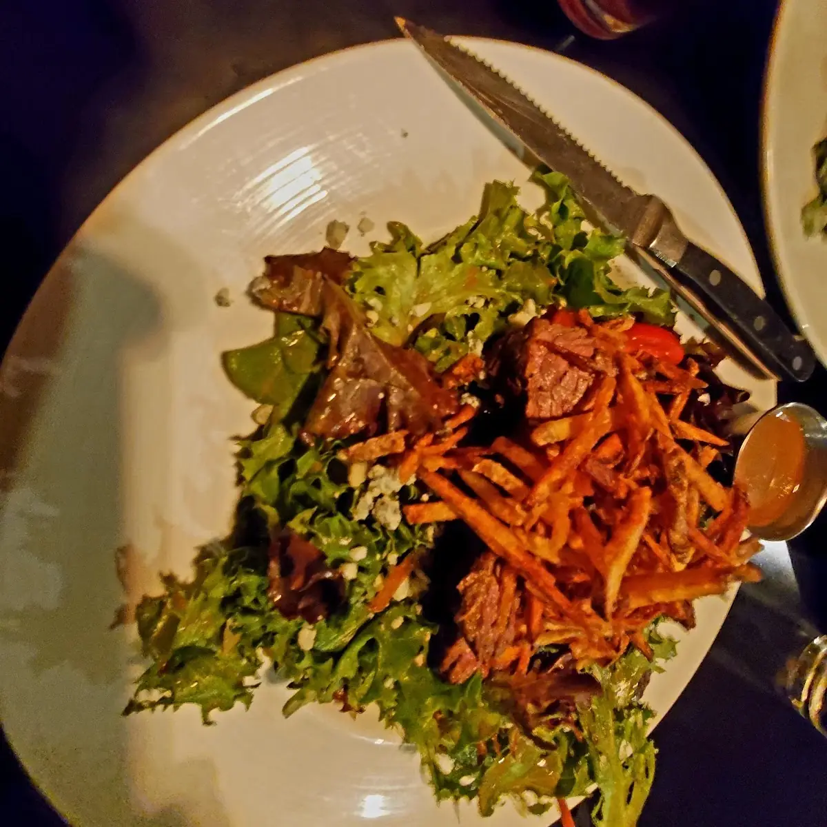 Steak Salad with Blue Cheese Crumbles Tomatoes & Crispy Potatoes & Ranch Dressing