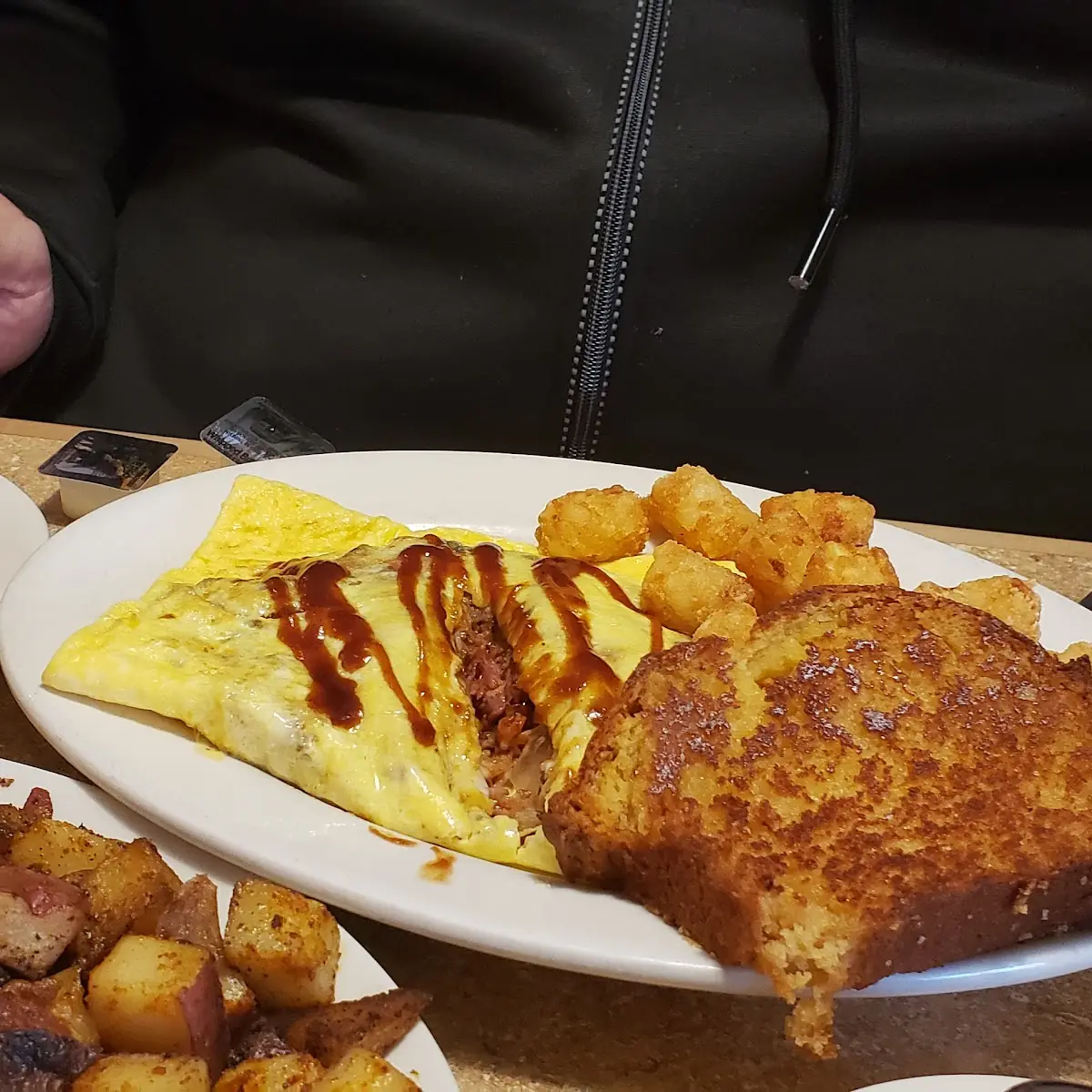 BBQ Pulled Pork Omelette with Homefries and Cornbread