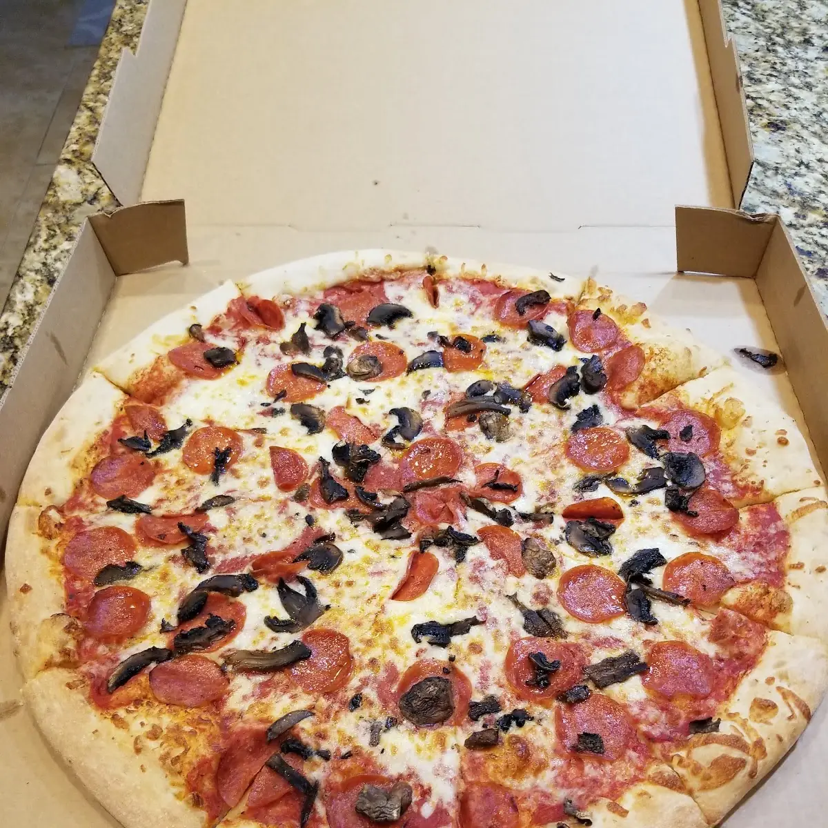 Pepperoni and Mushroom Pizza