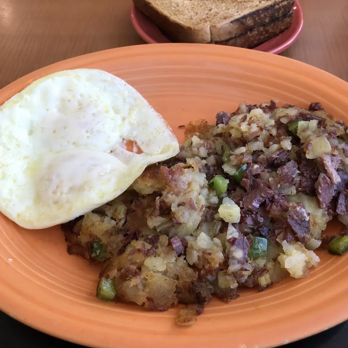 Corned Beef Hash with Eggs over Medium