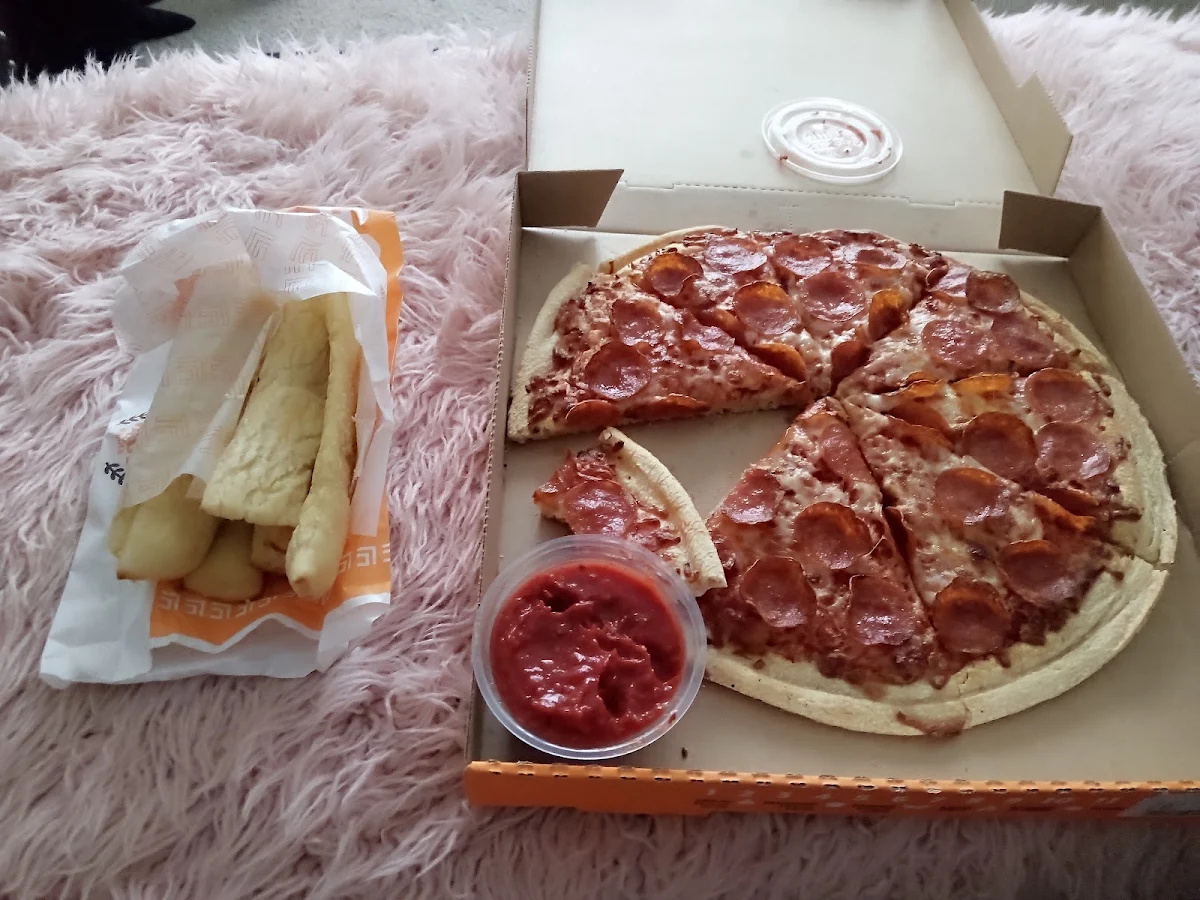 Garlic Breadsticks and Pepperoni Pizza